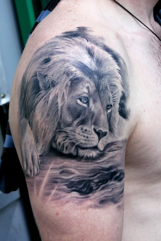 lion-tattoo-by-oleg-turyanskiy1.jpg