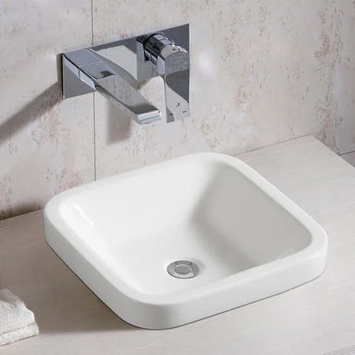 top-mount-ceramic-bathroom-wash-basin-500x500.jpg